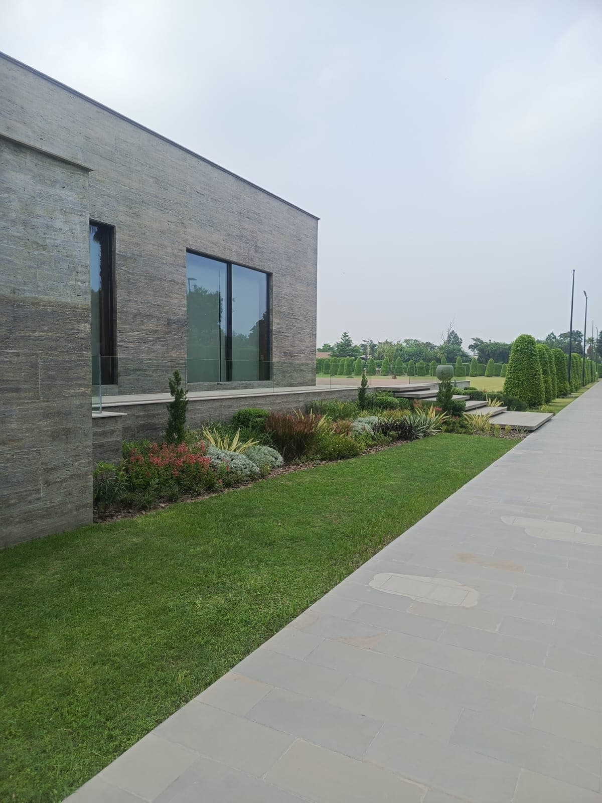 Landscaped garden surrounding a modern residence